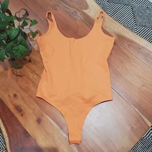 Stella Luce Pastel Orange Bodysuit